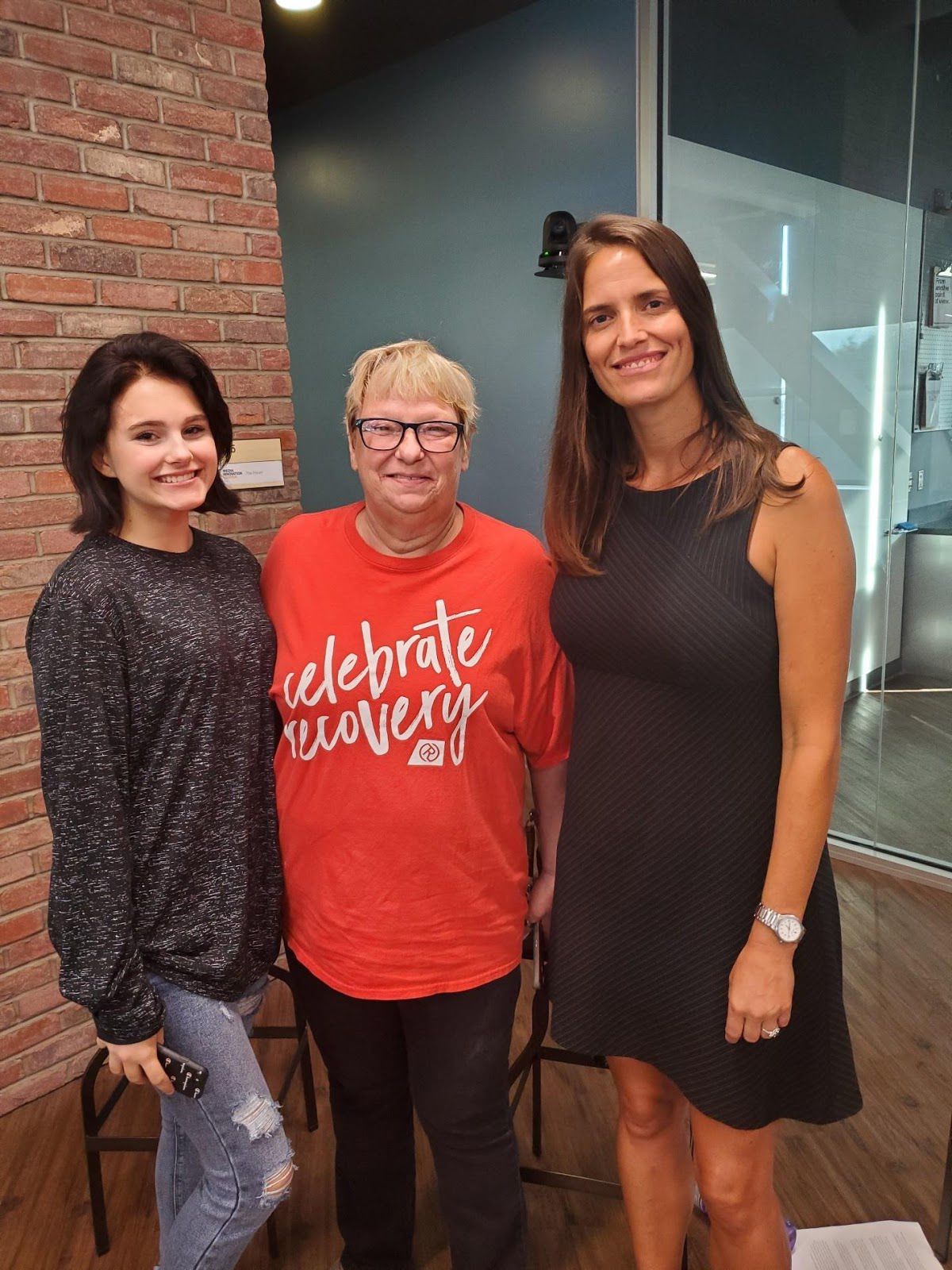 Lexi Utley, left, Judy Utley, center, and Lida Shepherd pose for a picture at the